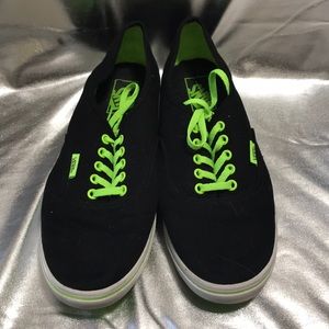 Black and neon green Vans